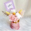 Pastel preserved flower box with roses and cotton blooms