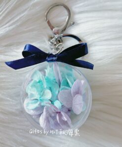 Mint and purple preserved hydrangea floral charm in acrylic case