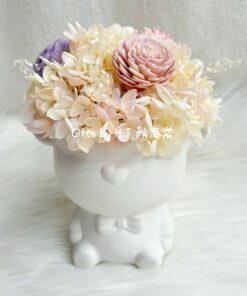 Bear and Bloom preserved flower arrangement in bear ceramic vase