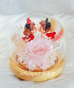 Romantic preserved glass dome with pink rose couple figurine