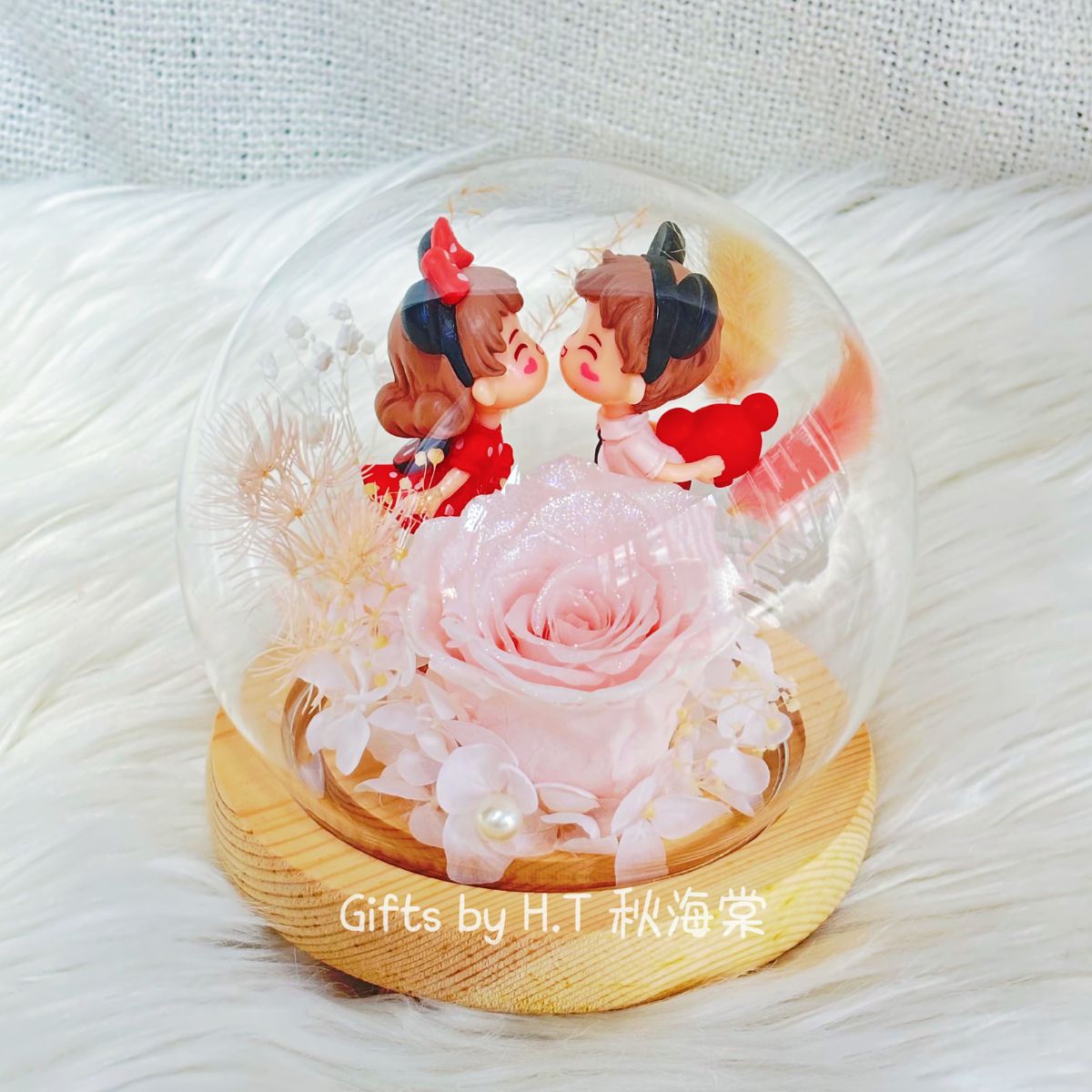 Romantic preserved glass dome with pink rose couple figurine