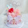 Preserved flower money cake with roses fairy lights and cash notes